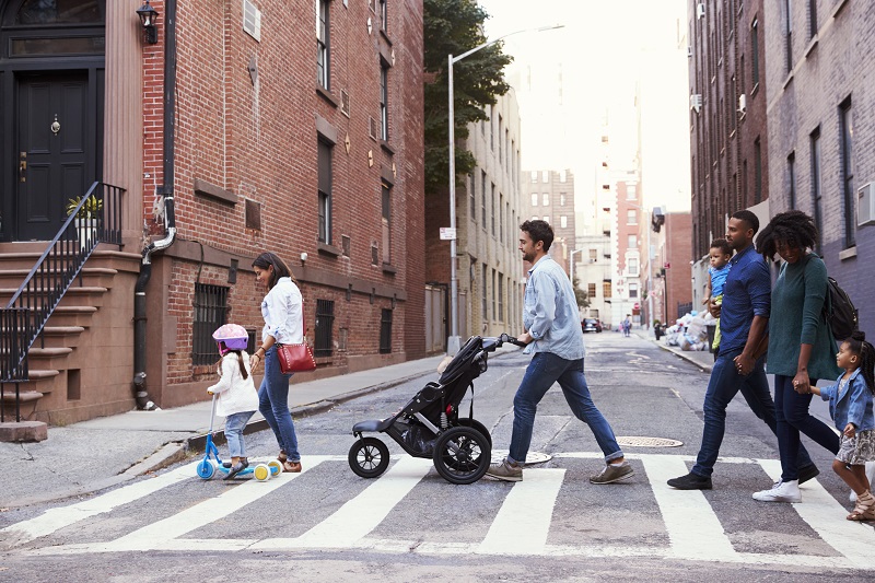 A group of pedestrians crossing the street.